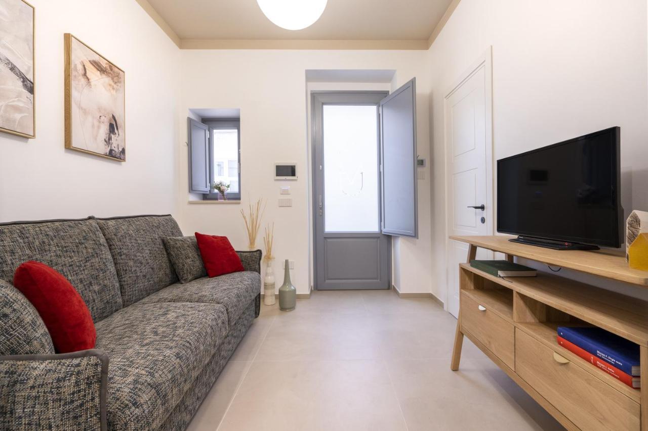 Dimora Maufra Apartment โลโกโรตอนโด ภายนอก รูปภาพ